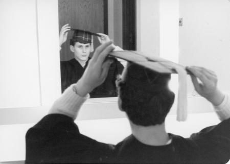 Graduating-student-with-cap-in-mirror