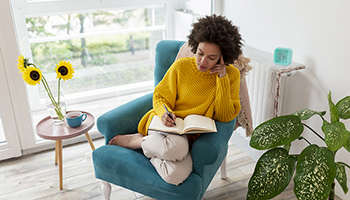 Woman reading in a chair